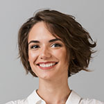 Image of happy young business woman posing isolated over grey wall background.